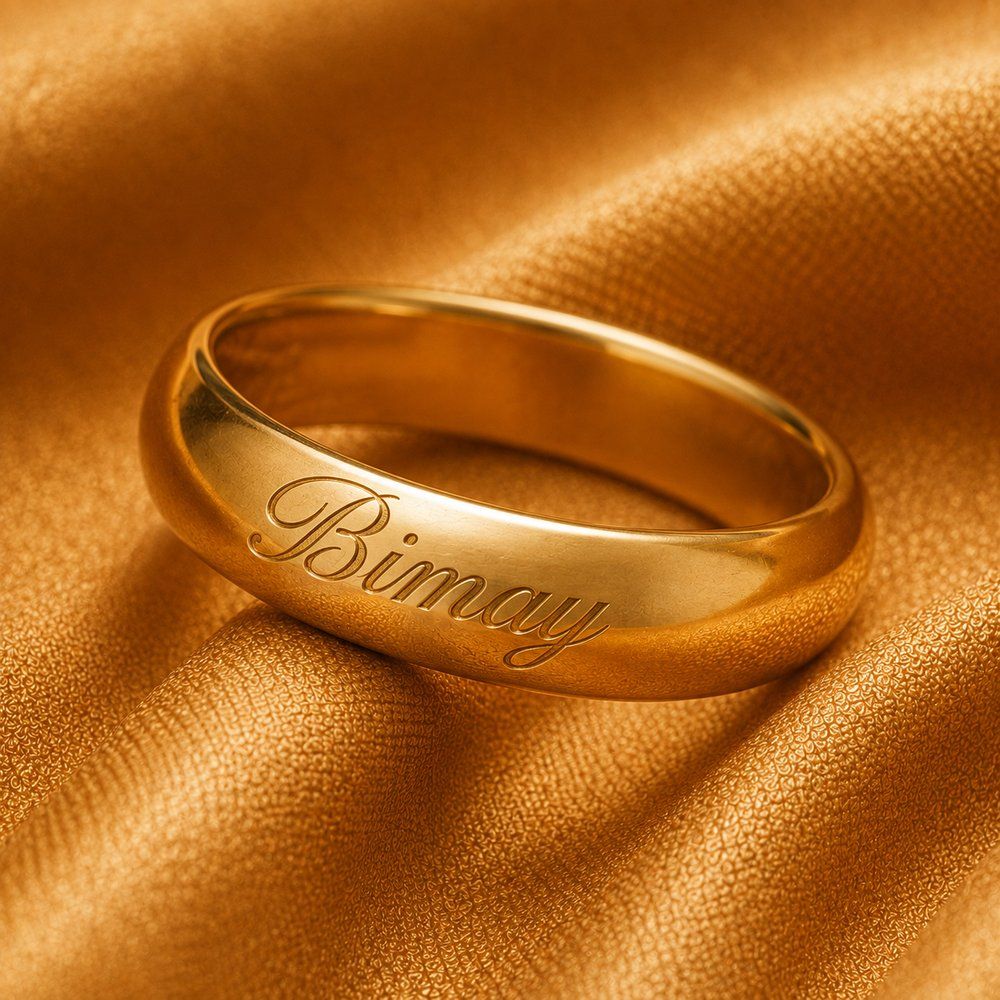 Gold ring with a personalized name engraving